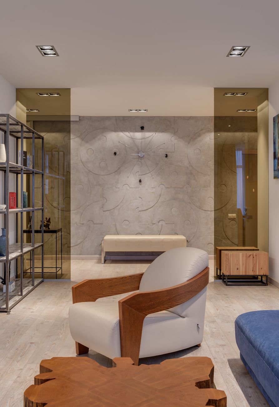 Interior of contemporary prestige living room with comfortable furniture and glass entrance in apartment